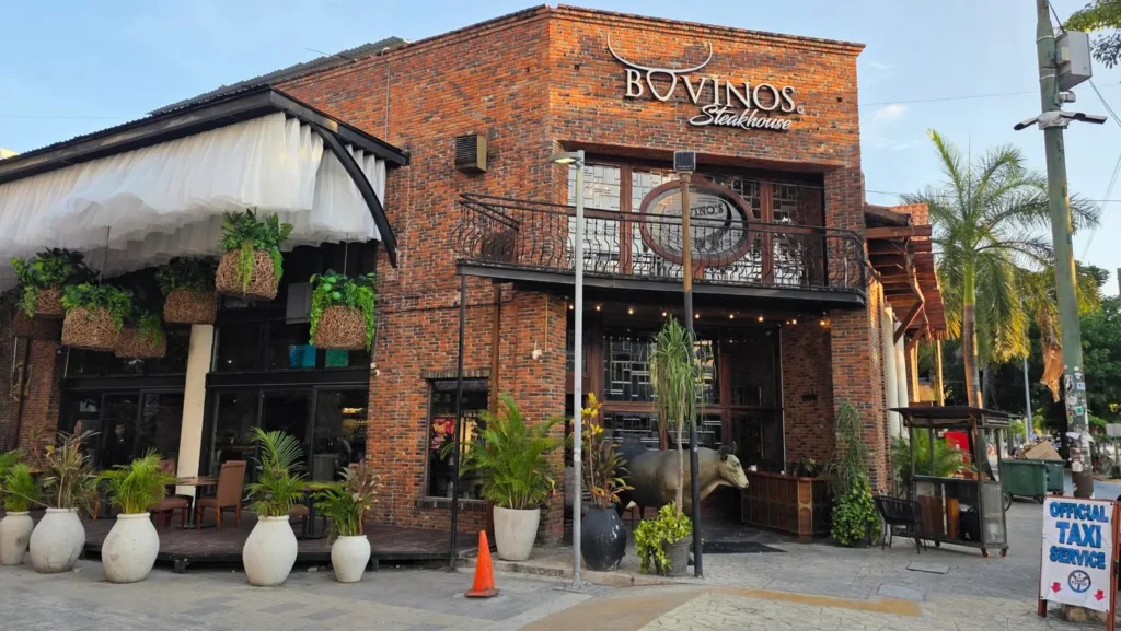Brick facade and entrance of Bovinos Steakhouse in Playa del Carmen
