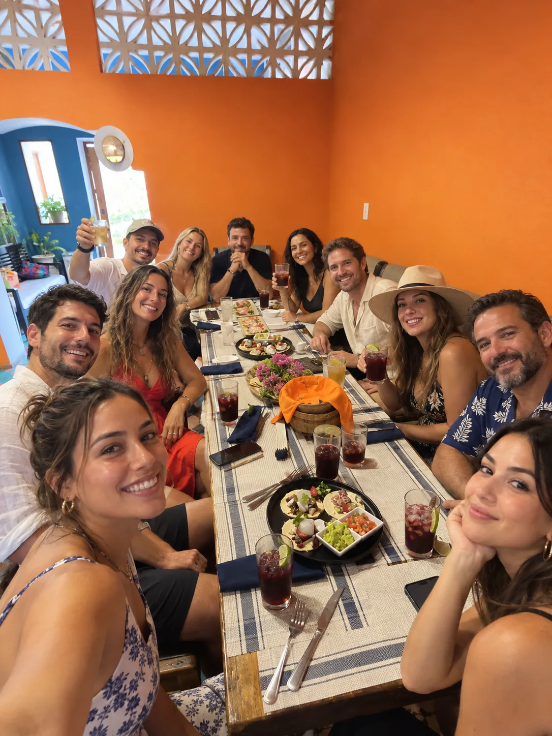 Guests sharing a meal at Paladar del Cura restaurant.