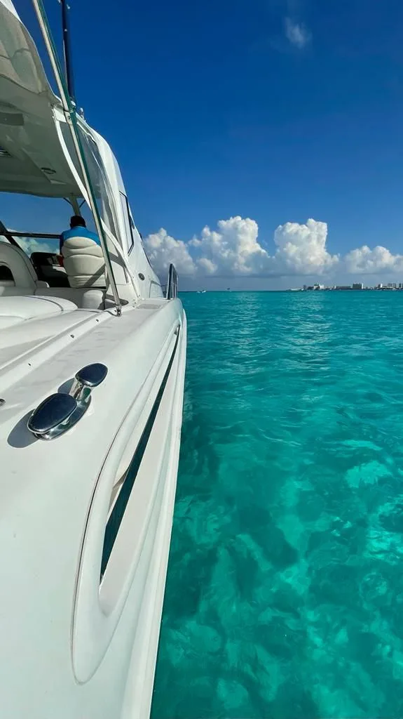 View along Tritón’s deck over the turquoise sea in Cancún